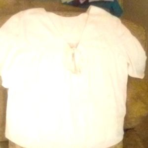 Ladies  Ann Taylor blouse, size medium, color cream